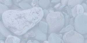 Pebbles and seaweed on a beach in Bude, Cornwall